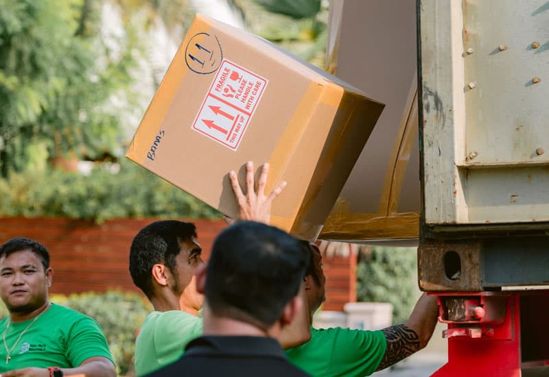 loading boxes onto moving truck